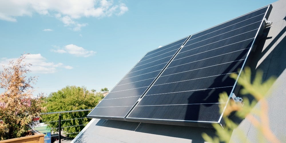 Two solar panels on a roof