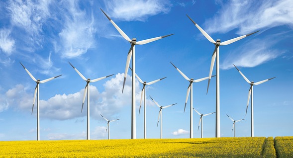 Wind turbines in an open field